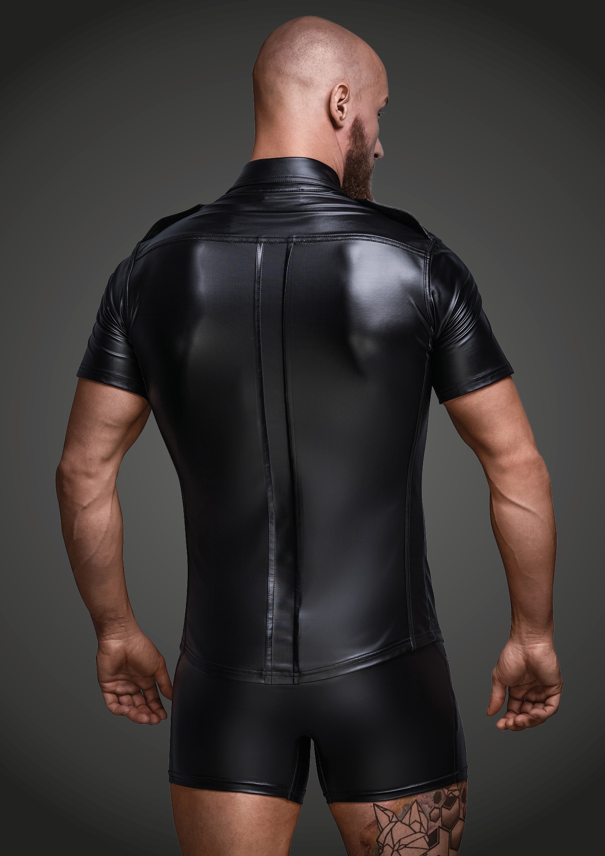 Sexy and elegant wetlook shirt for men. The shirt is fully buttoned in the front and two chest pockets. The perfect cut and the soft material ensures a perfect fit.
