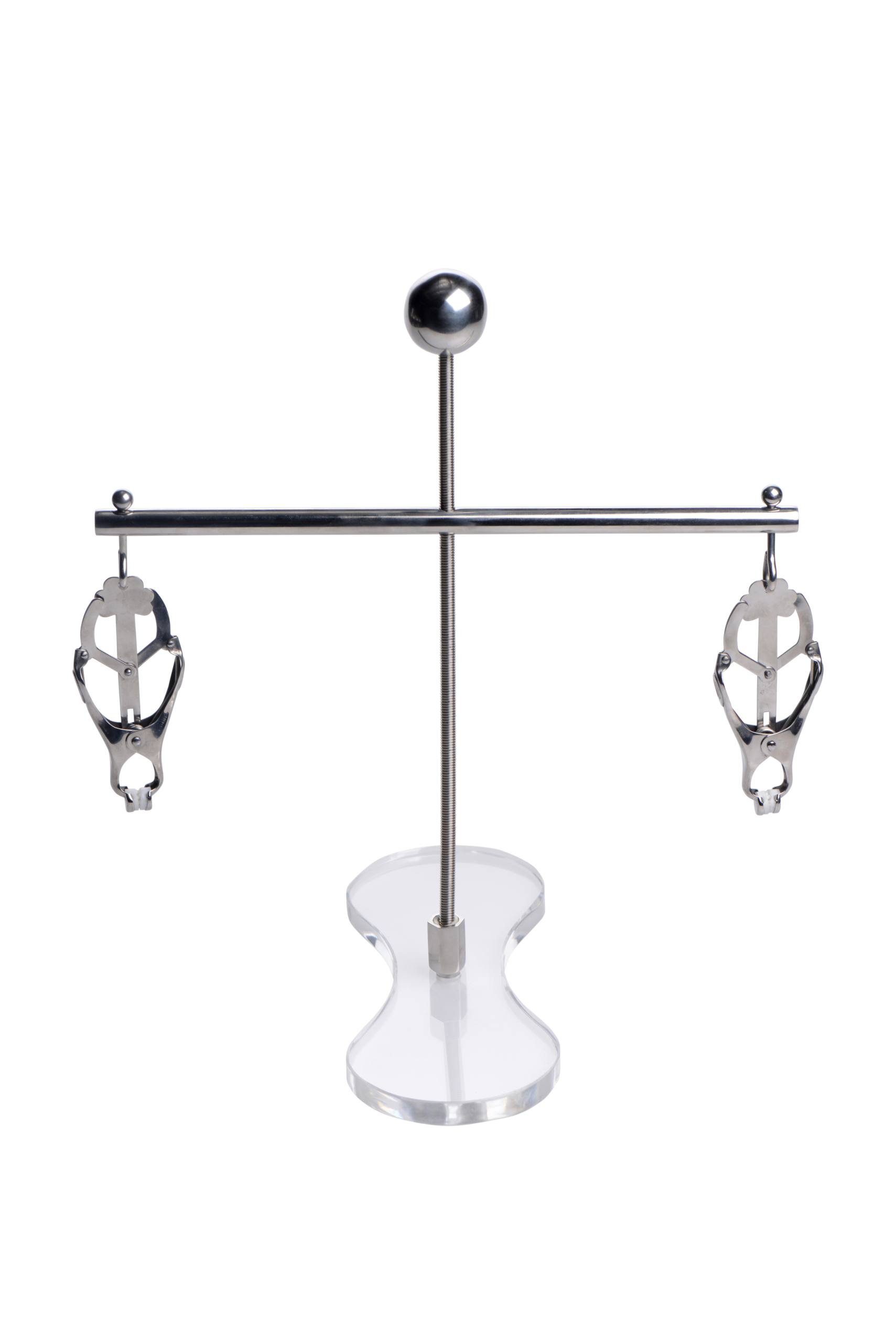 <p>The Tower of Pain includes to two Japanese Clover Clamps at each end of the rod. Once claps are attached to their nipples