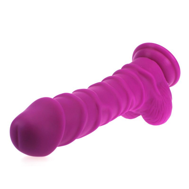 Large Penis shaped dildo with balls and ridged shaft on a suction base in pink colour.