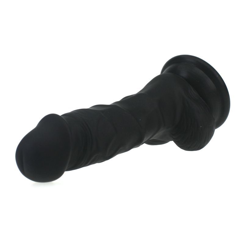 Large Penis shaped dildo with balls and veined shaft on a suction base in black colour