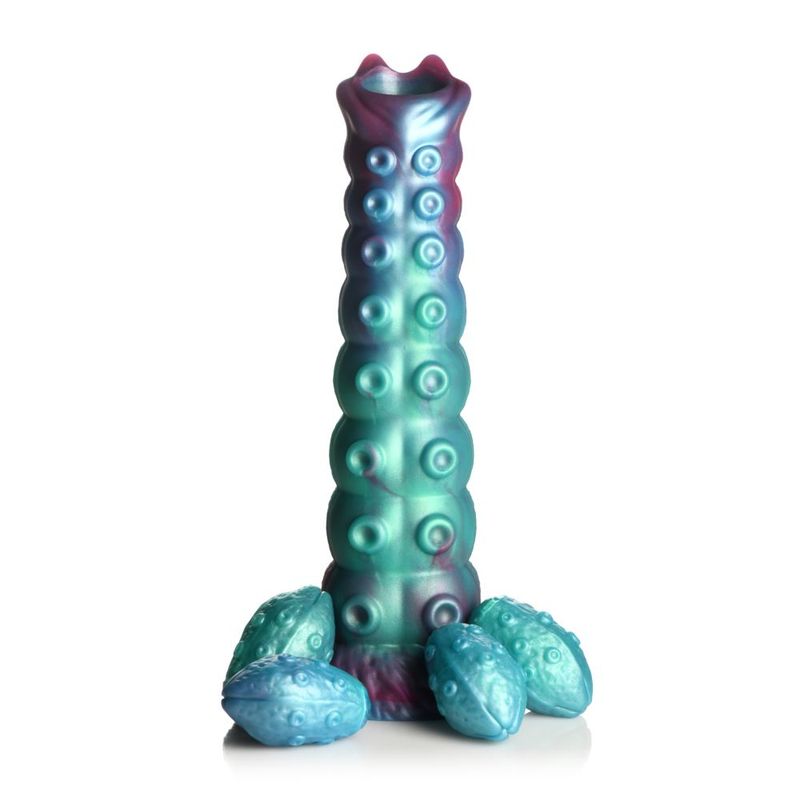 teal-red-blue colors catch the light and make it look mystical. The mysterious symbol engraved on the shaft belongs to a horny alien tribe far off in space. The segmented shaft has textured bumps along it and an open-mouth tip where 4 squishy eggs come out of. The wide base can be combined with a compatible strap-on harness for pegging play! Made from premium