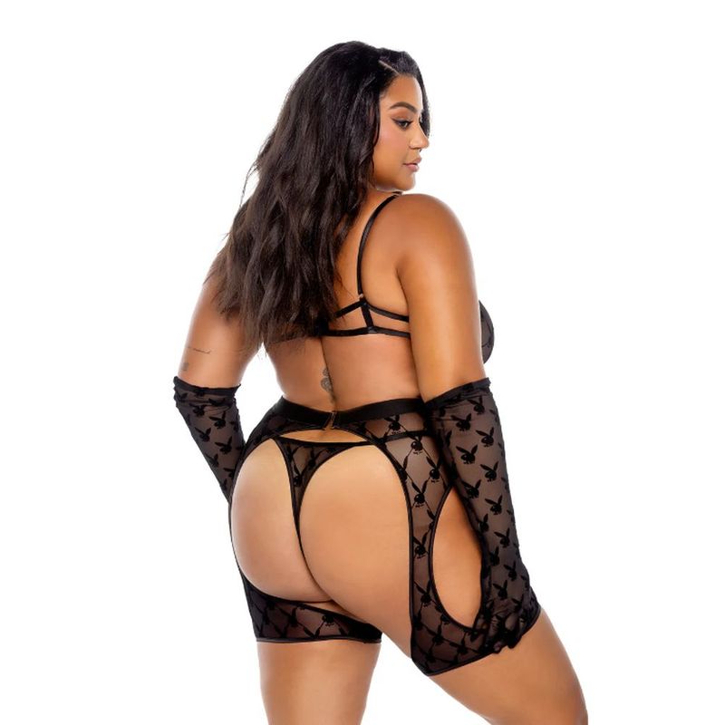 Stunning 3-piece lingerie set featuring a plunge cut underwire bra with elastic mesh thong and flexible chaps in an exclusive black flocked bunny treatment.